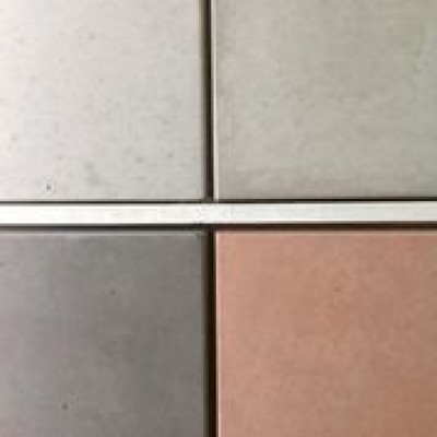 Four concrete paver colour and finish samples