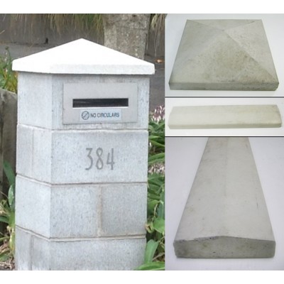 Pyramid, flat and bullnose concrete wall cap samples beside a capped mailbox pillar